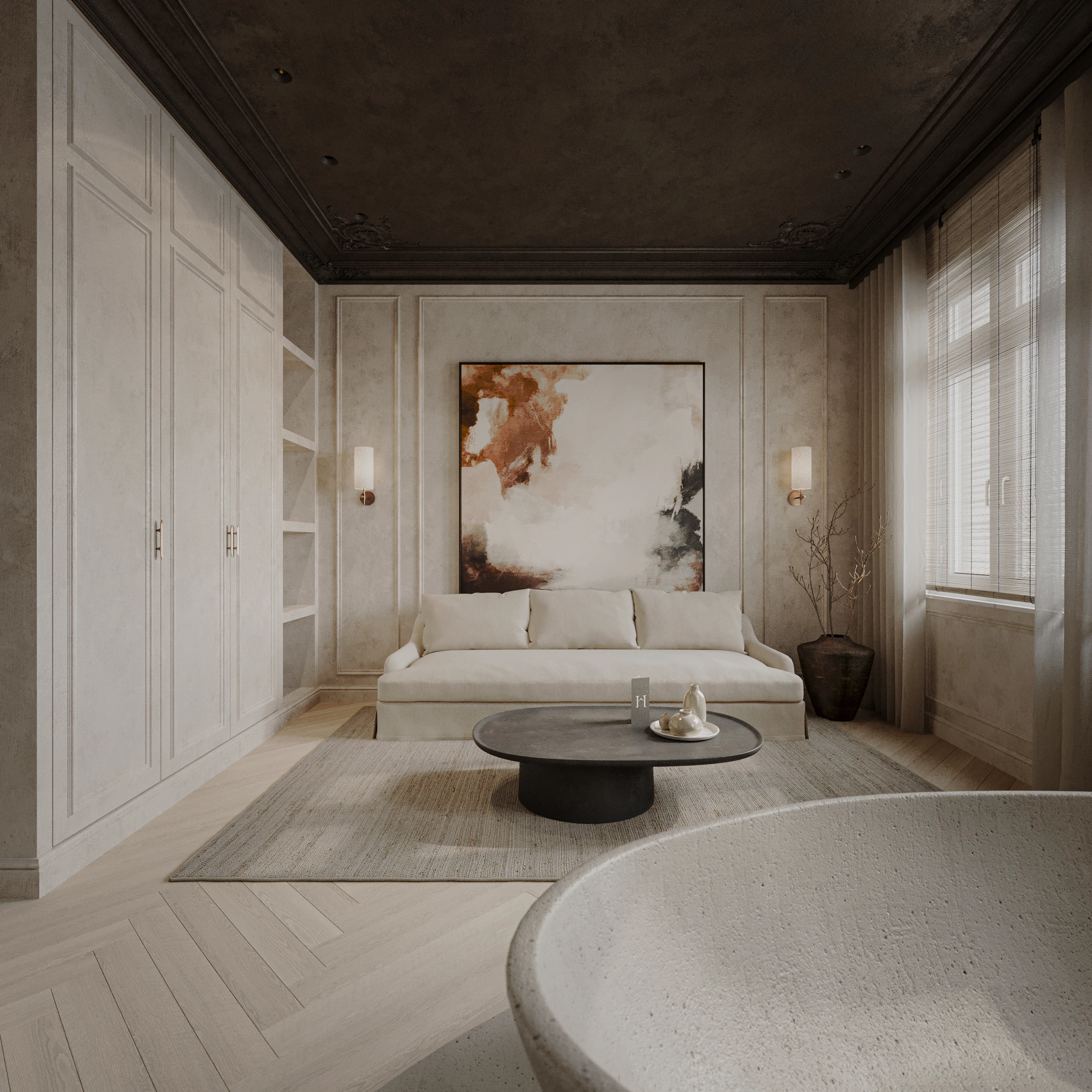 Zitbank in suite kamer Heritage die kan omgetoverd worden tot slaapbank met kast en tafeltje.